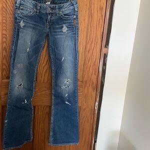 Silver jeans size 26 some white paint on pants